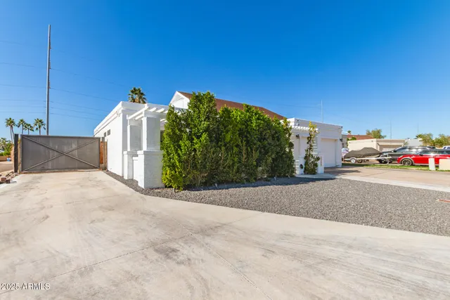 a view of a street with a building in the background