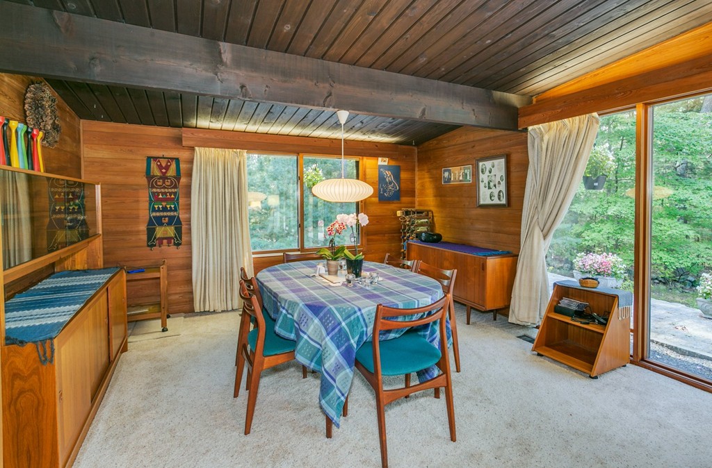 27 Conant Road Lincoln, MA 01773 - Photo 4 of 16 a dining room with blue lights space table and chairs