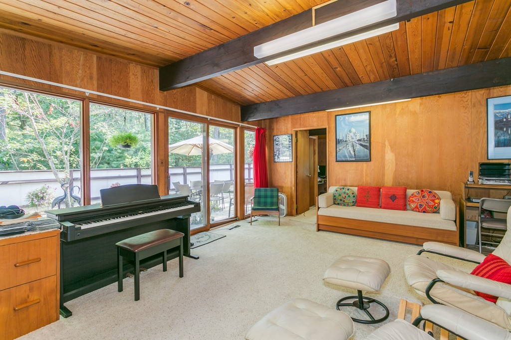 27 Conant Road Lincoln, MA 01773 - Photo 5 of 16 a living room with furniture a rug and a large window