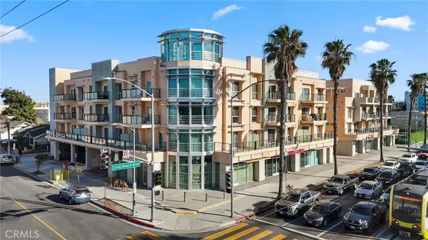 a front view of a building with street view