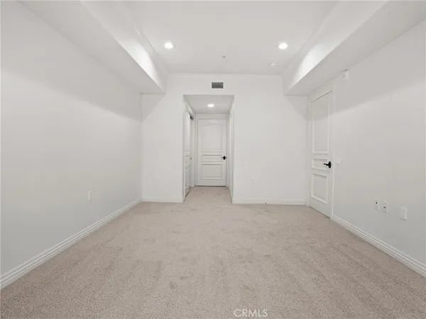 an empty room with an entryway