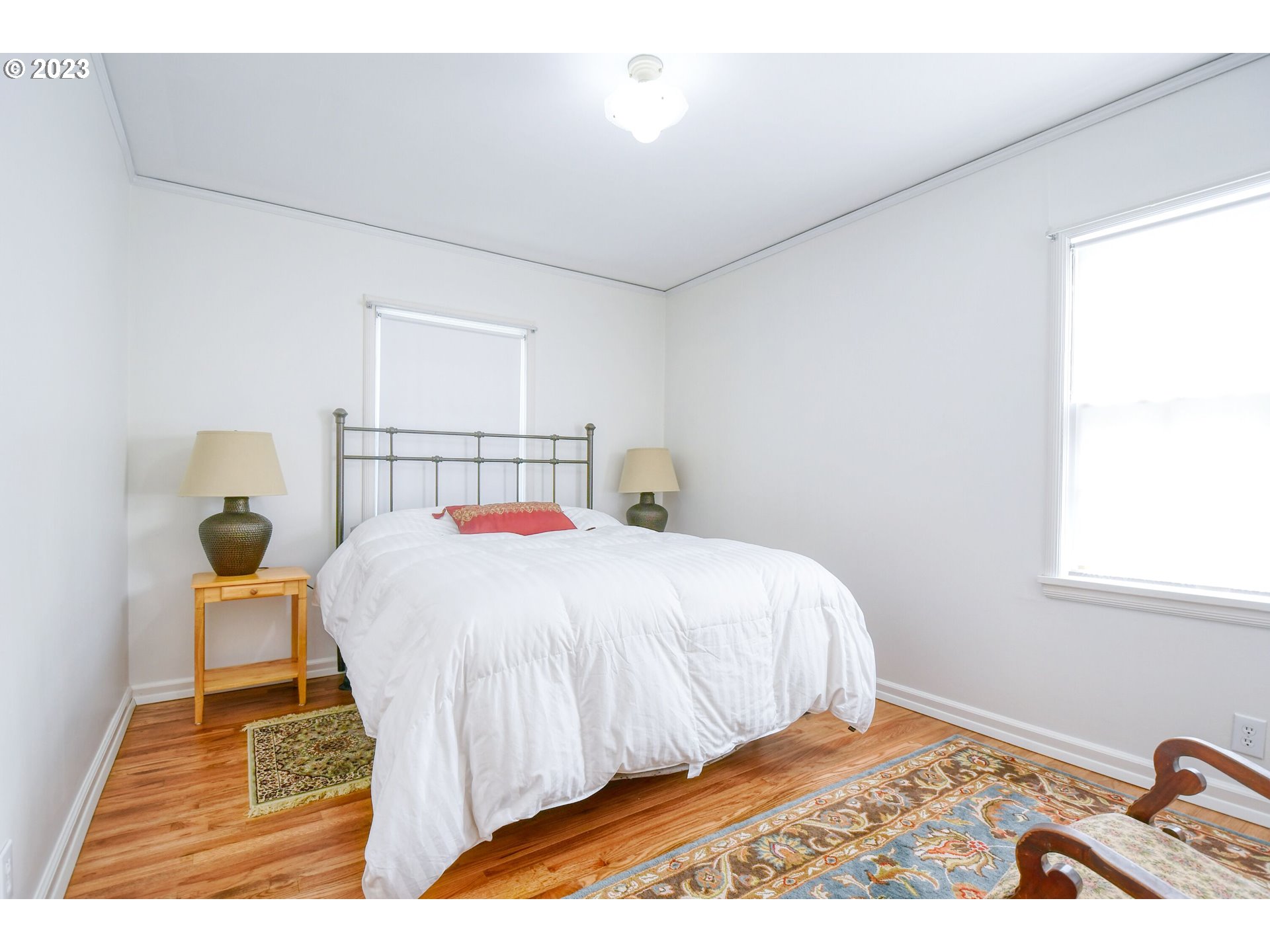 630 Northwest 9th Street Pendleton, OR 97801 - Photo 16 of 45 a bedroom with a bed and window