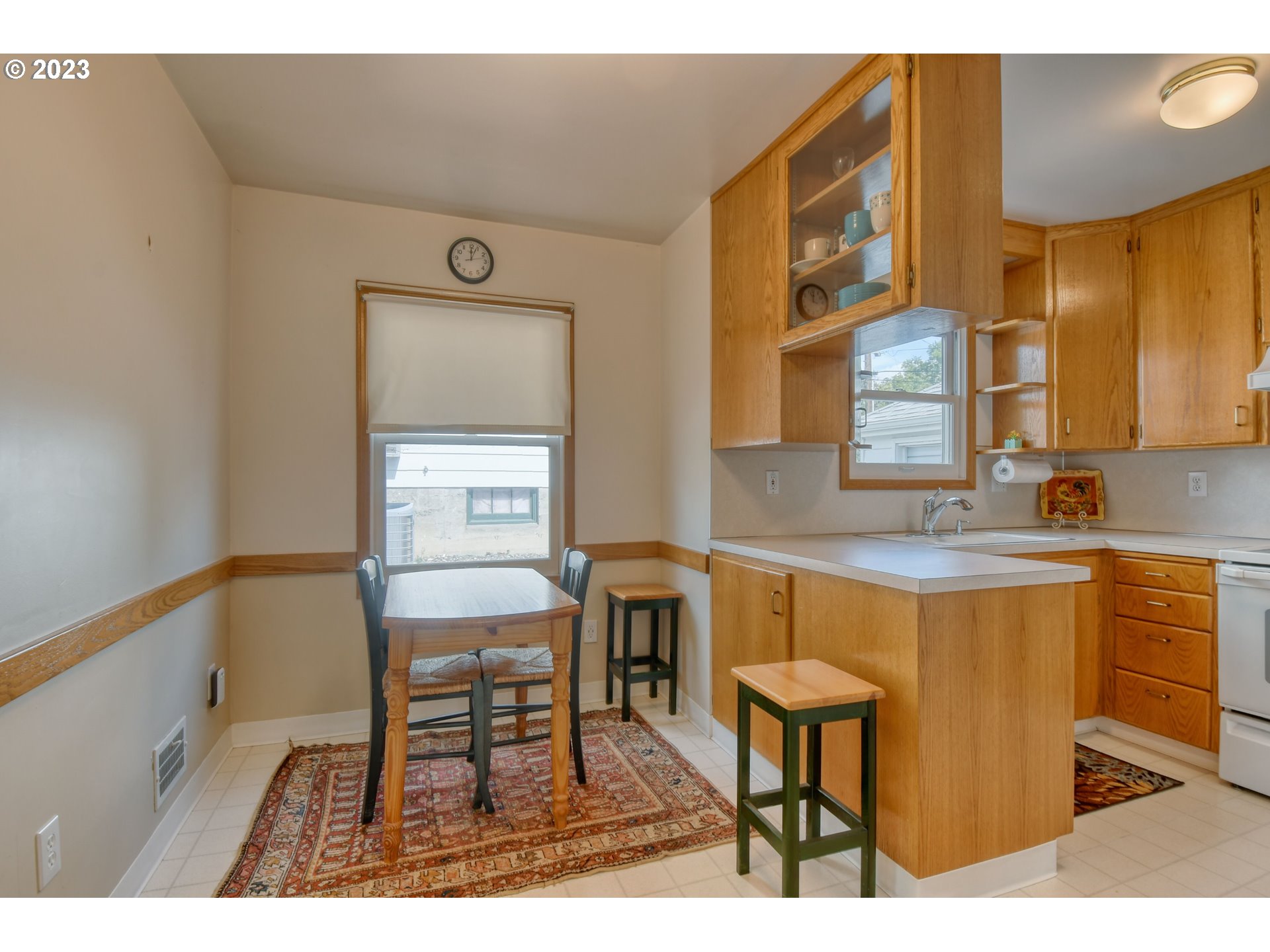 630 Northwest 9th Street Pendleton, OR 97801 - Photo 10 of 45 a view of a kitchen area with furniture and window