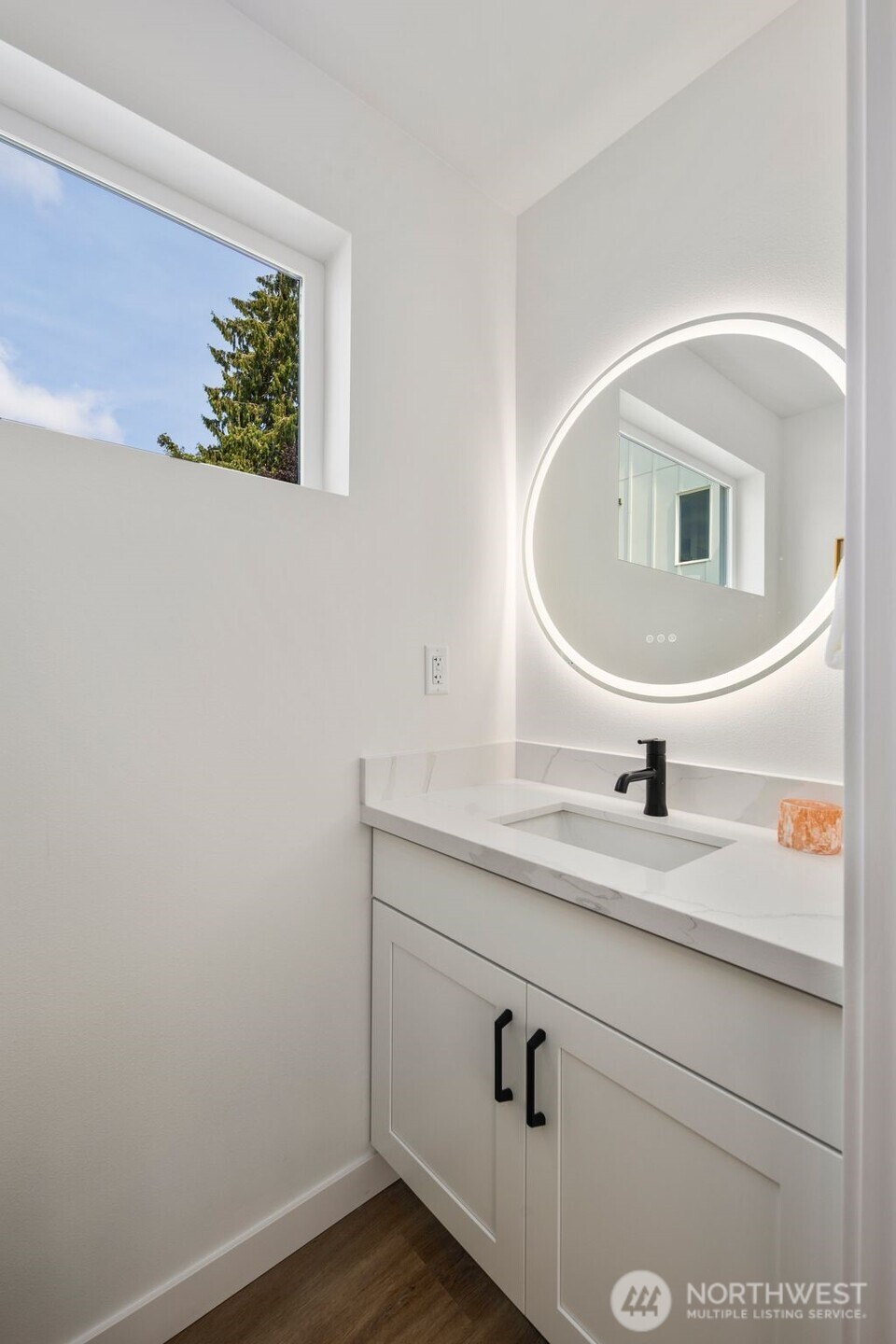 820 South Sullivan Street Seattle, WA 98108 - Photo 11 of 18 a bathroom with a sink and a mirror