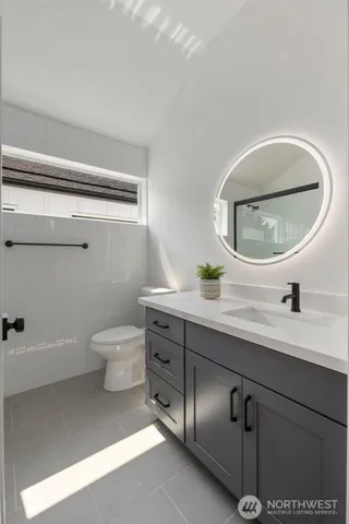 a bedroom with bed and a window