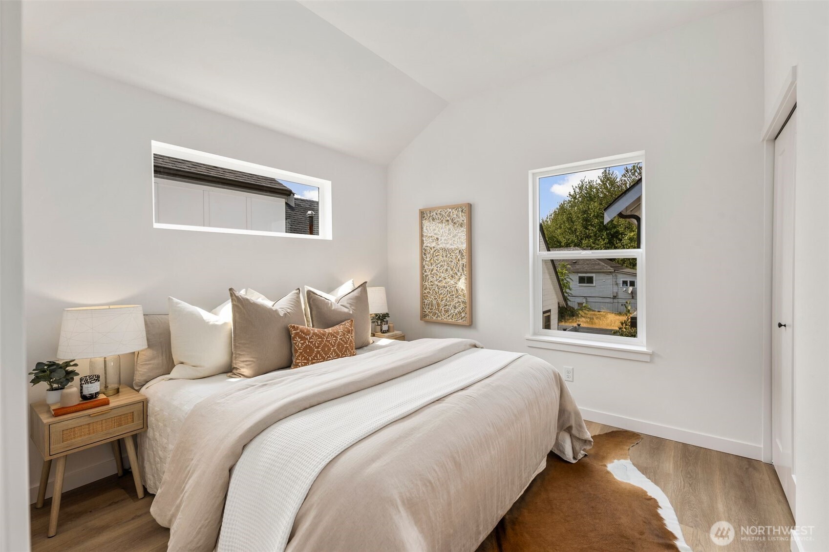 820 South Sullivan Street Seattle, WA 98108 - Photo 15 of 18 a bedroom with bed and a window