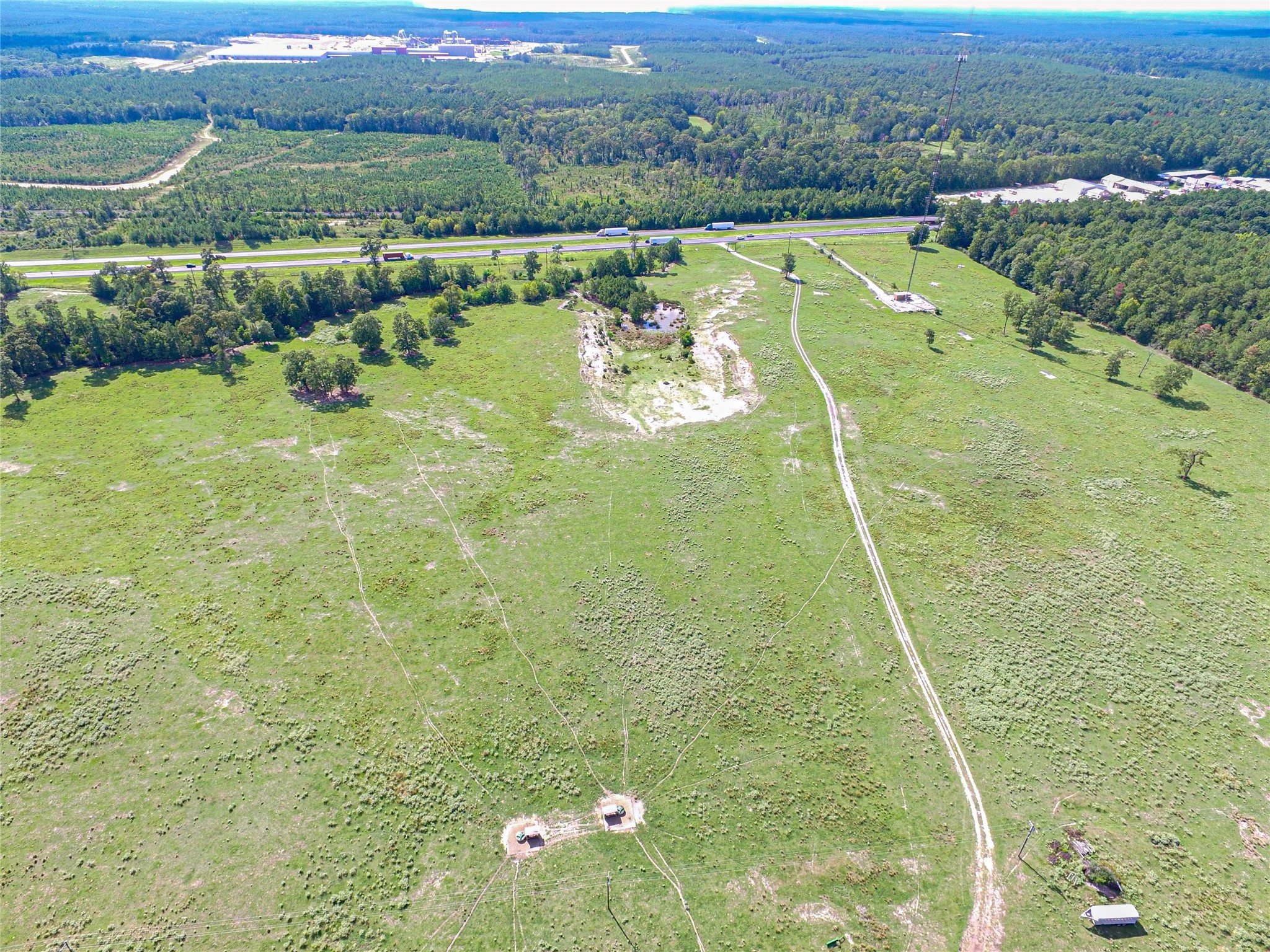 20720 Highway 59 Corrigan, TX 75939 - Photo 16 of 50 a view of a lake with a mountain