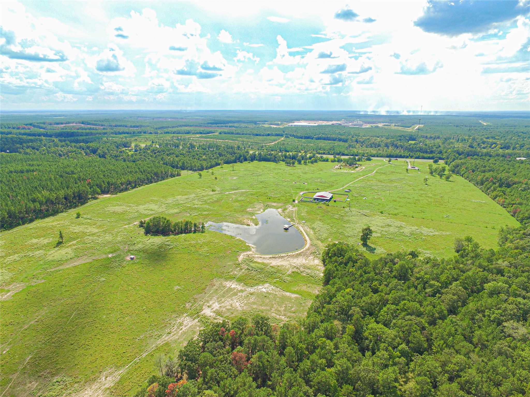 20720 Highway 59 Corrigan, TX 75939 - Photo 3 of 50 a view of a lake with a big yard