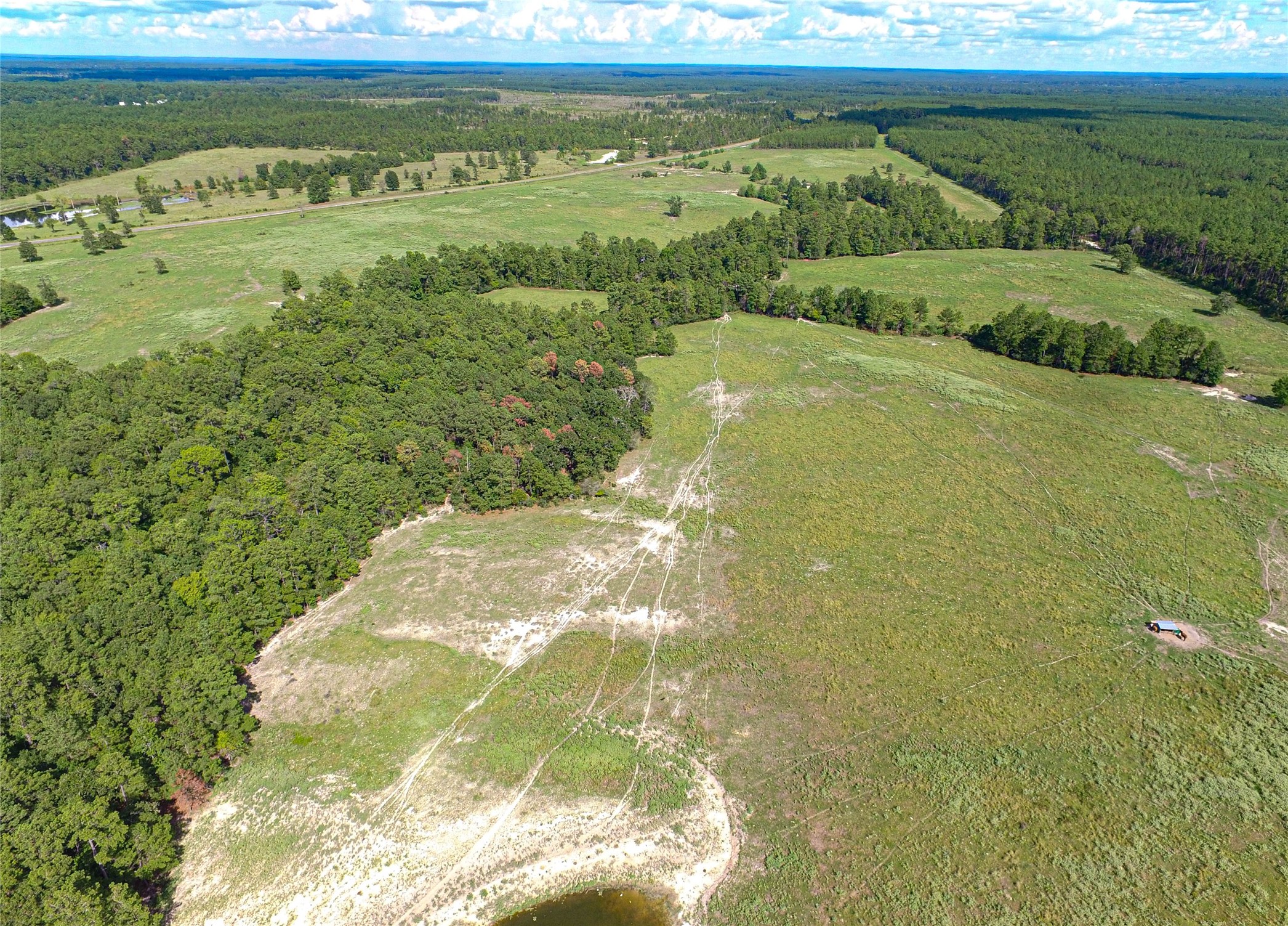 20720 Highway 59 Corrigan, TX 75939 - Photo 9 of 50 a view of a lake from a yard