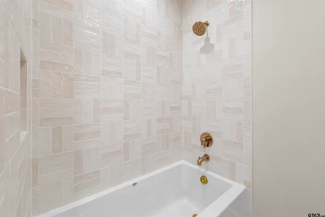 a bathroom with a bathtub