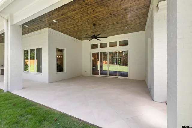 a view of a house with a porch and balcony