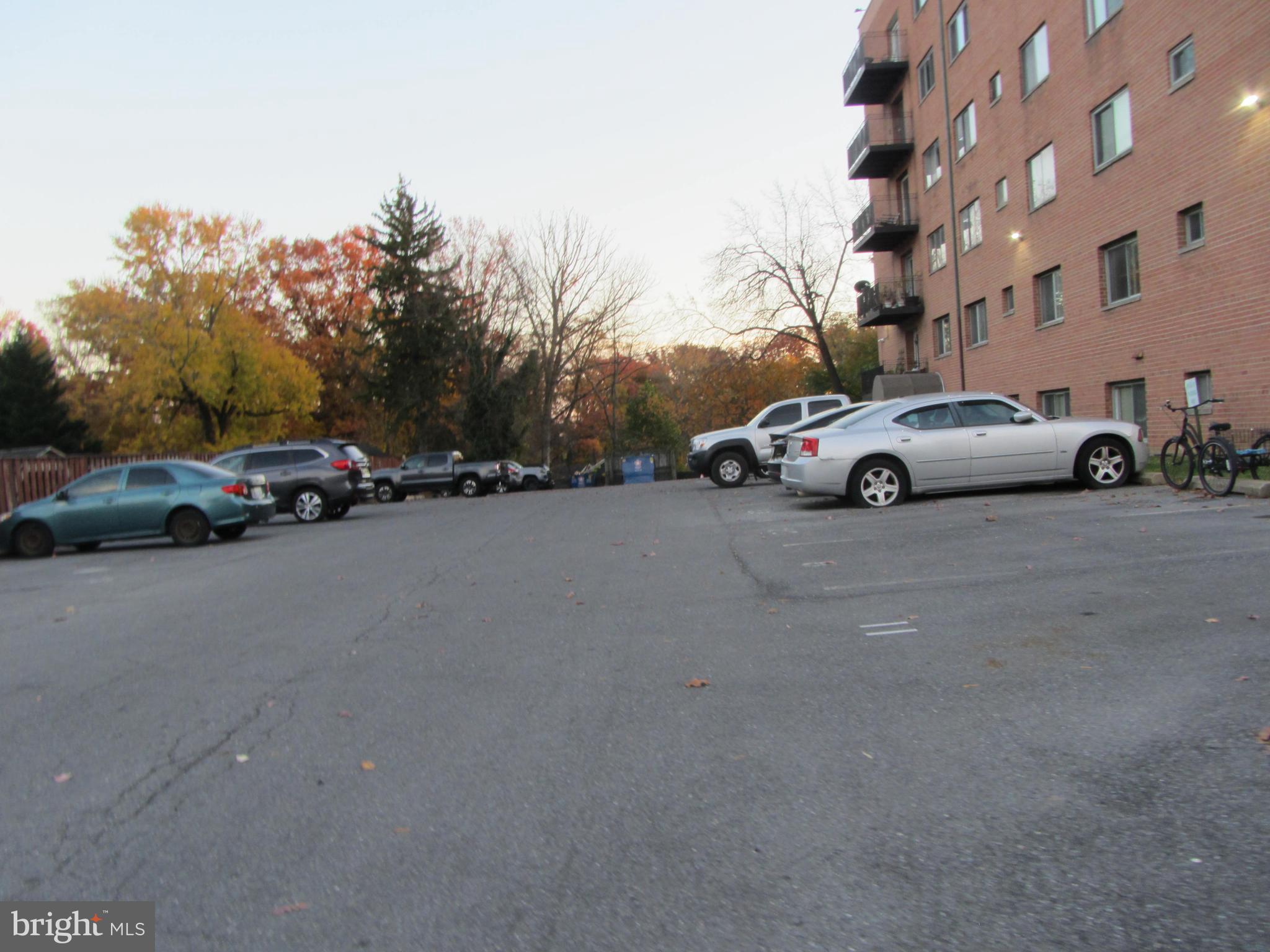 614 Sligo Avenue, Unit 303 Silver Spring, MD 20910 - Photo 6 of 31 a view of street with parked cars