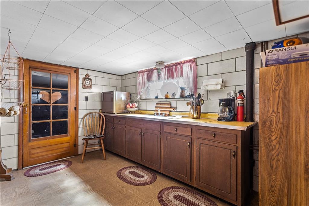 153 George Street Rochester, PA 15074 - Photo 19 of 25 a kitchen with refrigerator and window