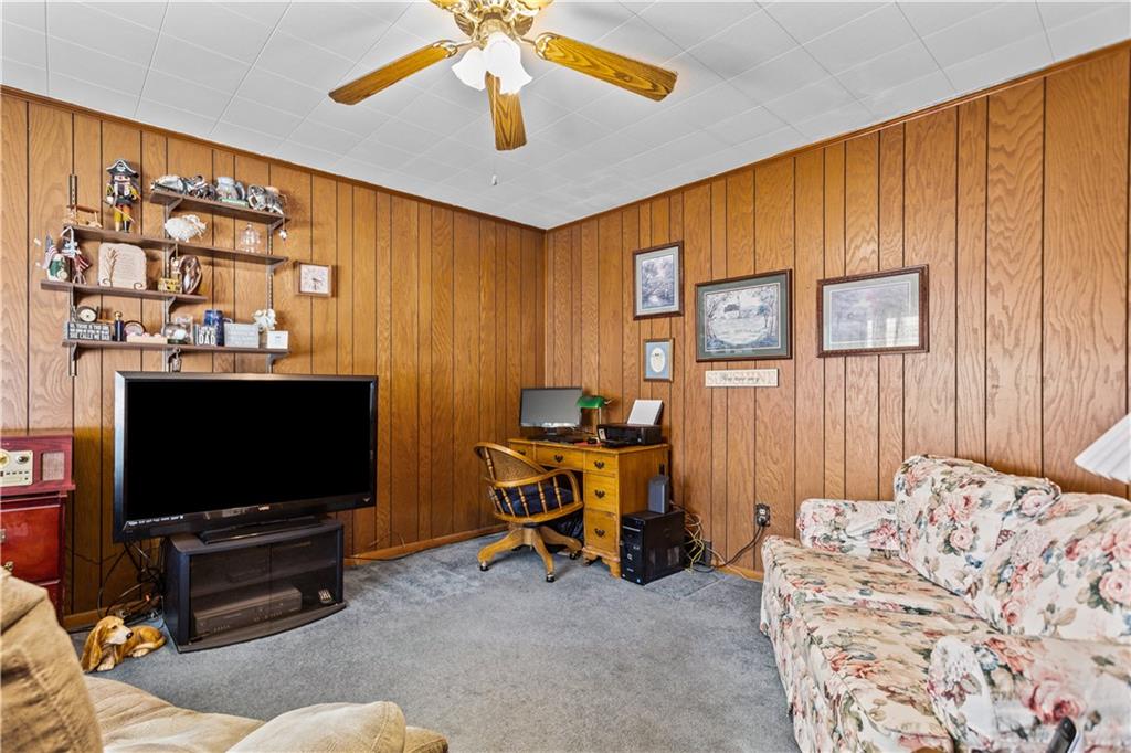153 George Street Rochester, PA 15074 - Photo 9 of 25 a living room with furniture and a flat screen tv