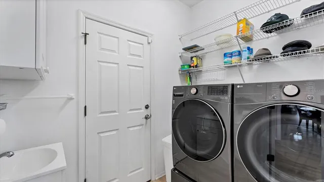 a utility room with dryer and washer