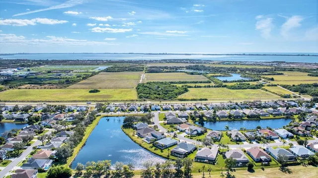 a view of a city with an ocean