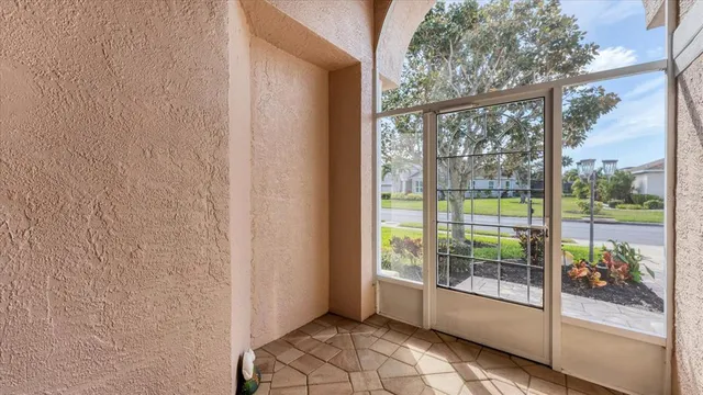 a view of a room with a large window
