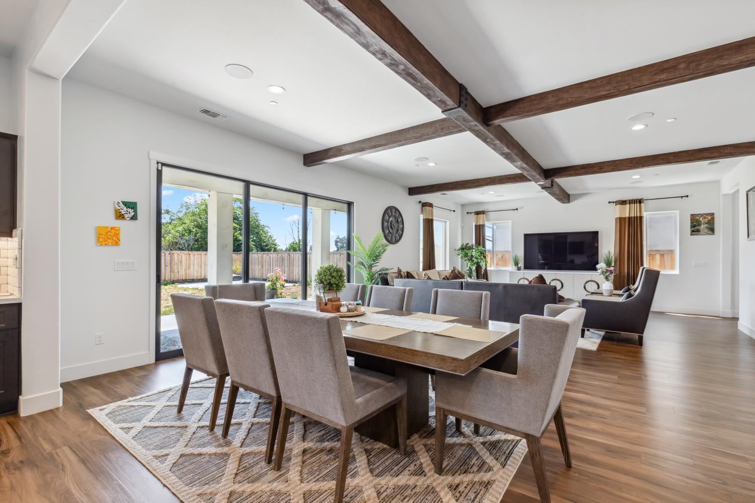 1765 North Renn Avenue Clovis, CA 93619 - Photo 17 of 50 a view of a dining room with furniture window and wooden floor