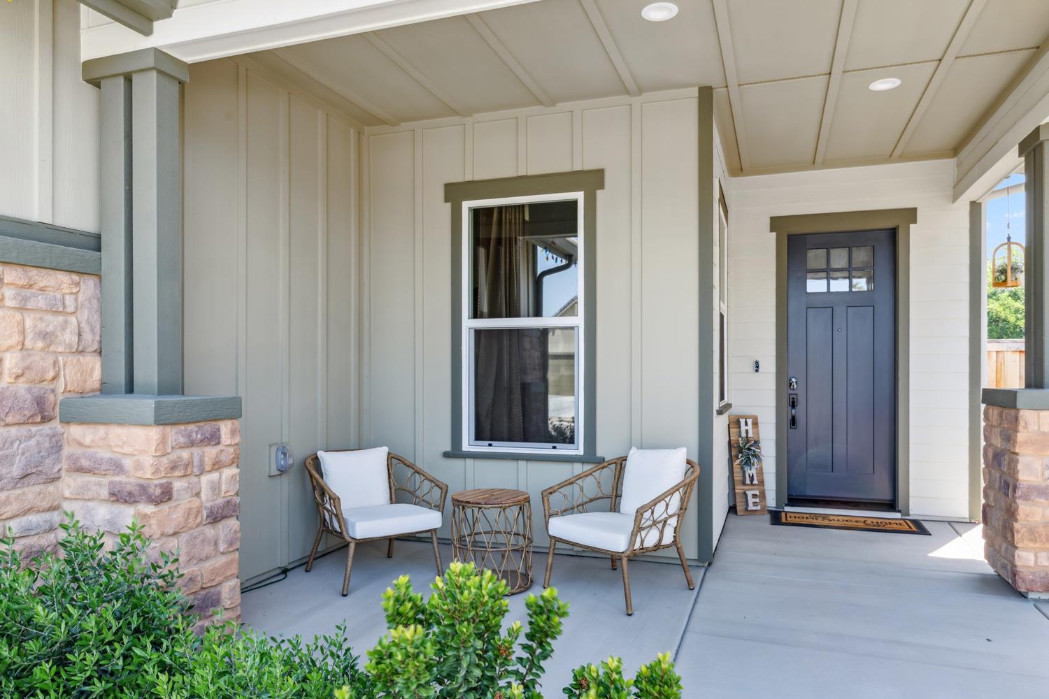 1765 North Renn Avenue Clovis, CA 93619 - Photo 2 of 50 a view of a patio with table and chairs and potted plants