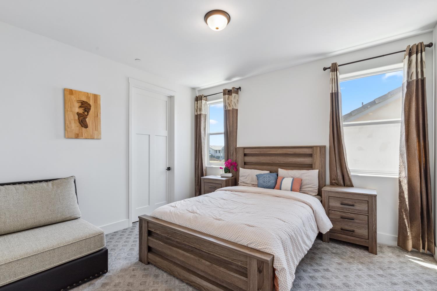 1765 North Renn Avenue Clovis, CA 93619 - Photo 29 of 50 a bedroom with a bed and a couch