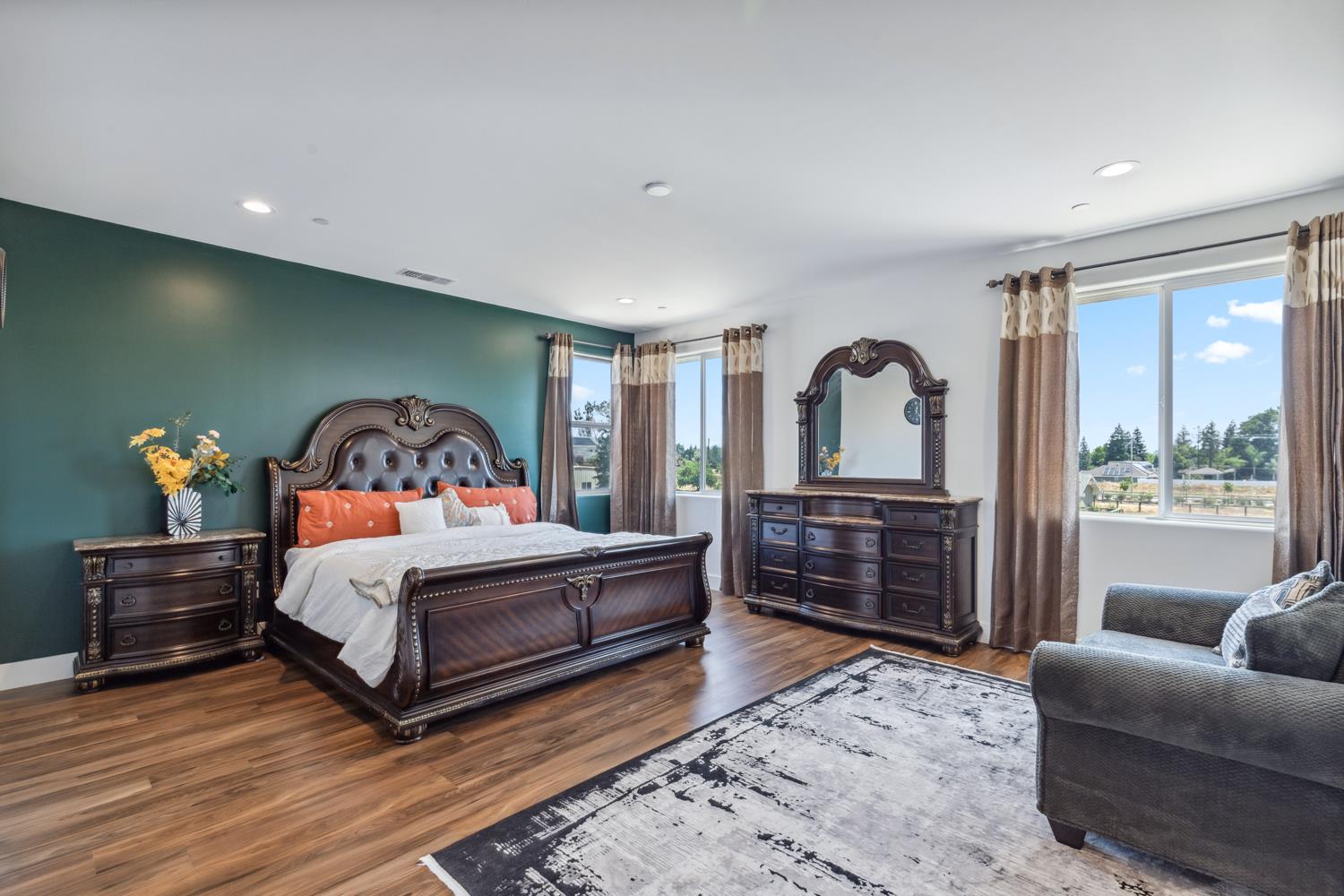 1765 North Renn Avenue Clovis, CA 93619 - Photo 33 of 50 a bedroom with a bed and a dresser