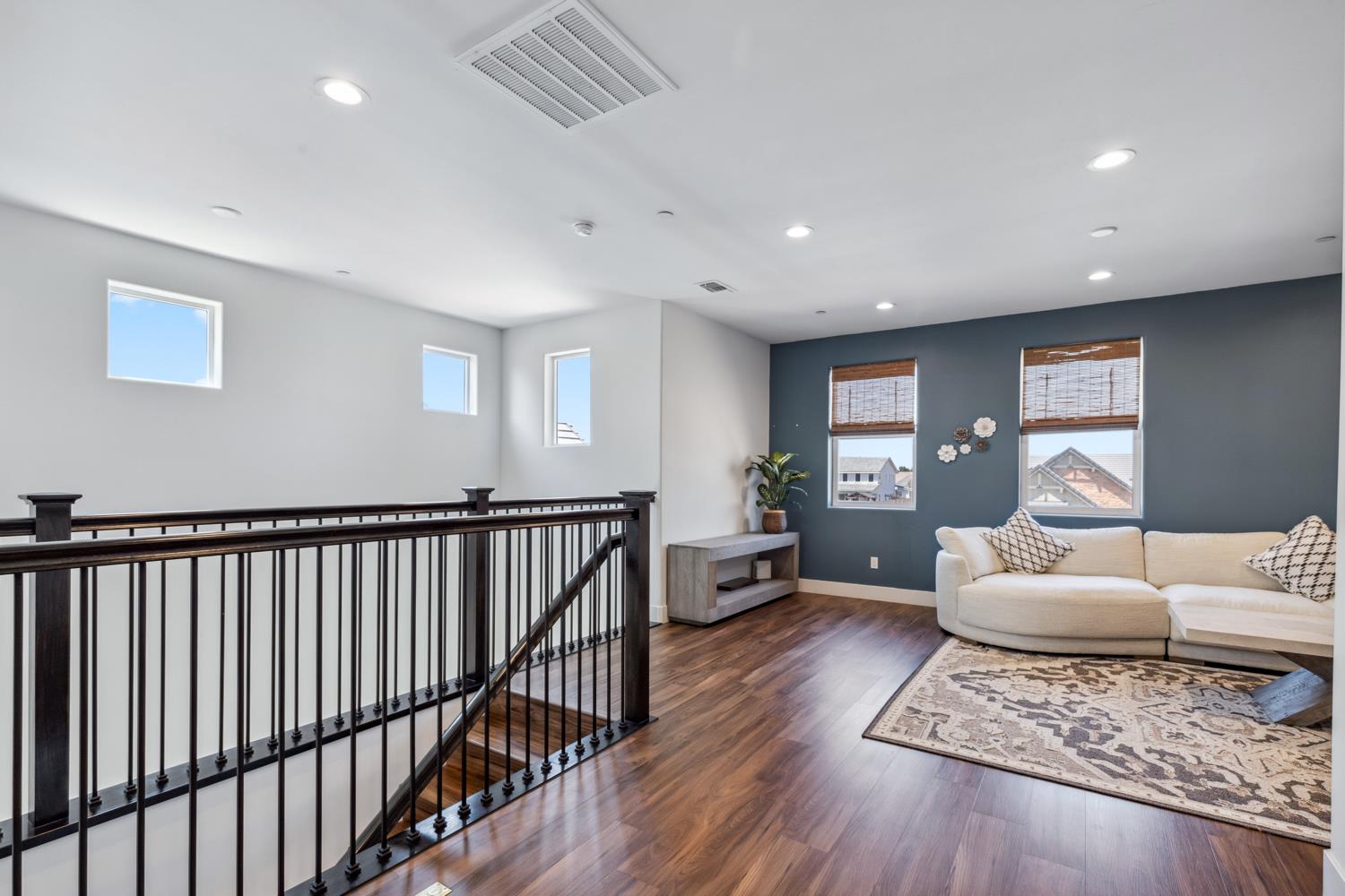 1765 North Renn Avenue Clovis, CA 93619 - Photo 39 of 50 a living room with furniture and wooden floor