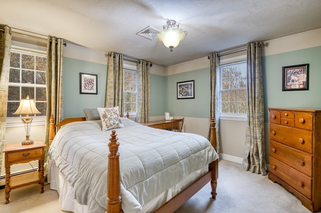 20 Clark Circle Hanover, MA 02339 - Photo 17 of 35 a bedroom with a bed and a cabinets