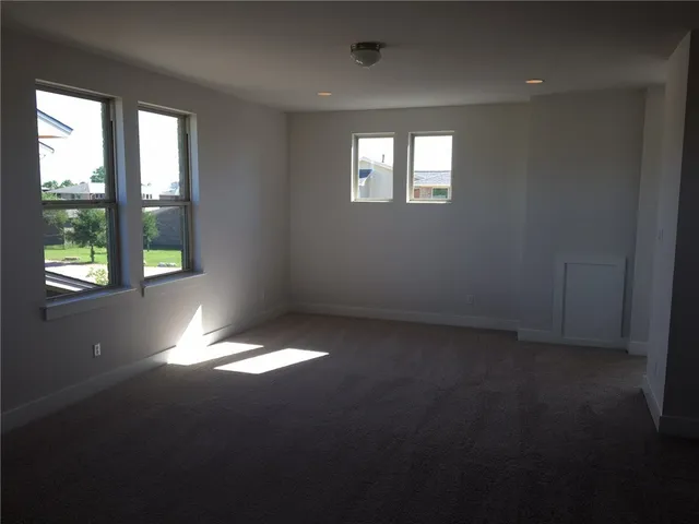wooden floor and windows in a room