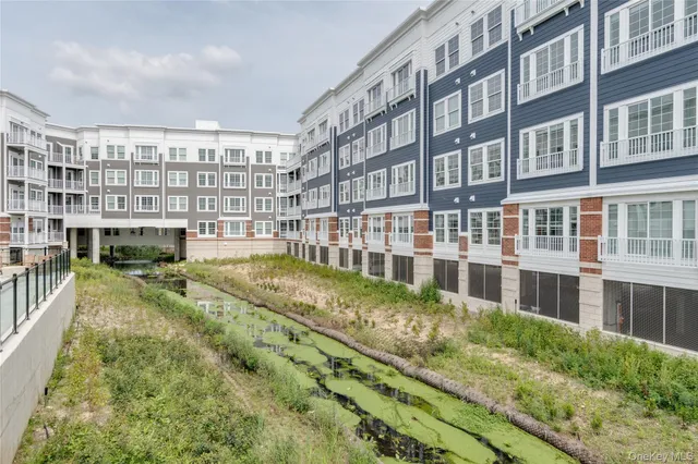 a view of building with yard