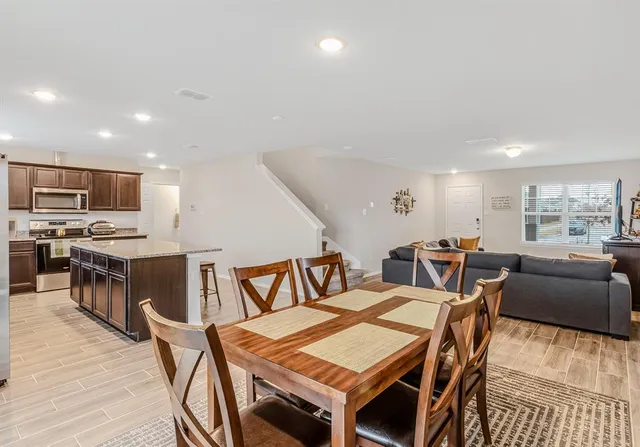 a view of a dining room with furniture