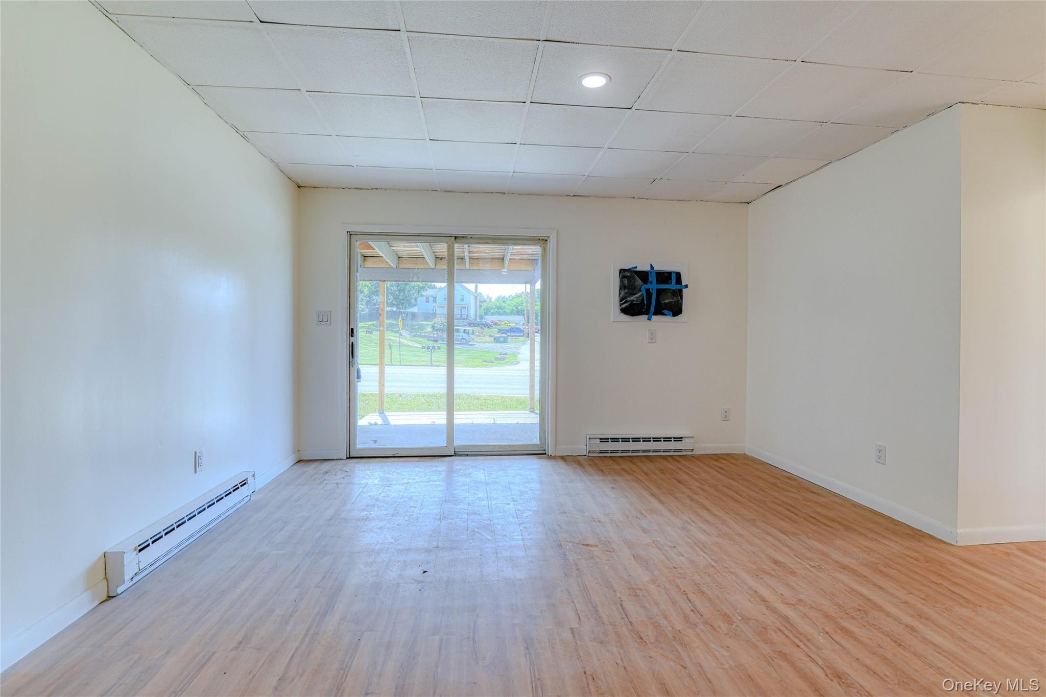 1614 Rte 9W, Unit 3 Milton, NY 12547 - Photo 2 of 13 wooden floor in an empty room with a window