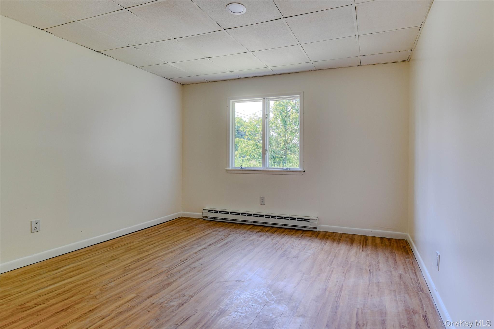 1614 Rte 9W, Unit 3 Milton, NY 12547 - Photo 10 of 13 a view of a room with wooden floor and a window