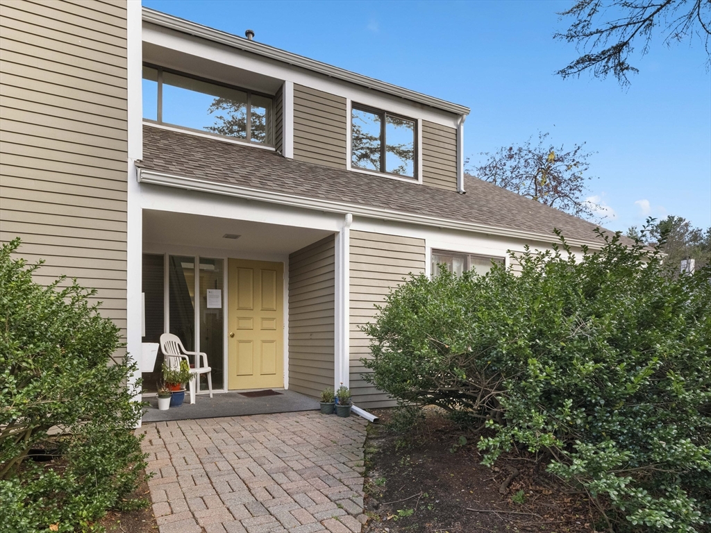 18 Concord Greene, Unit 6 Concord, MA 01742 - Photo 1 of 31 a front view of a house with garden
