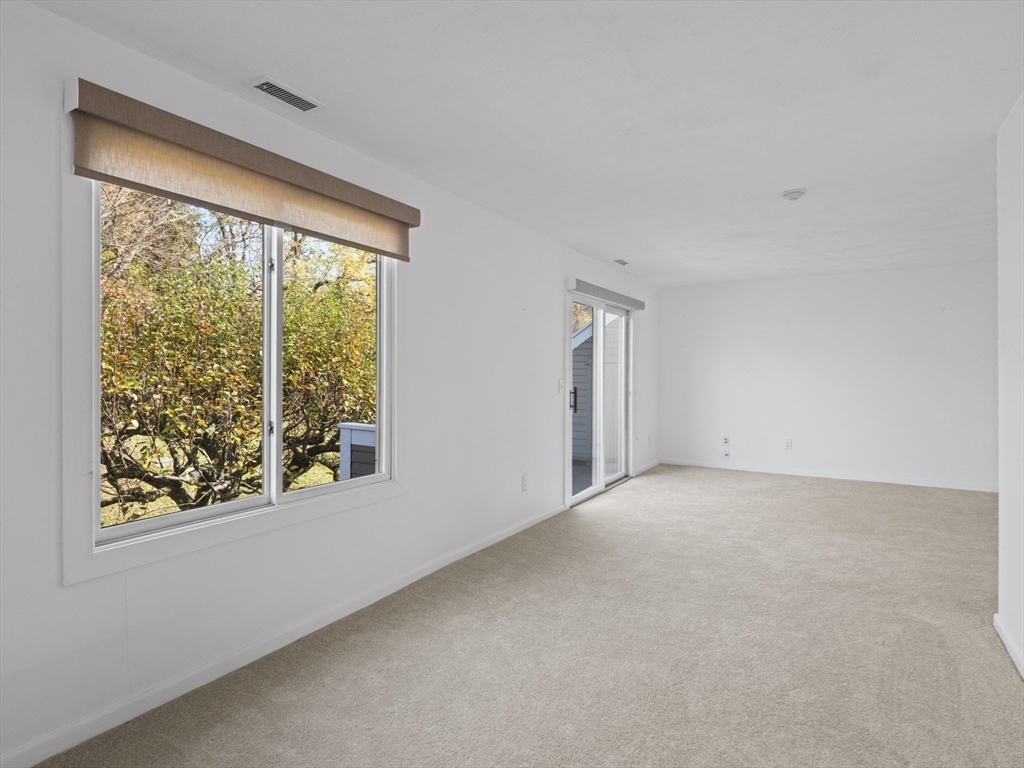 18 Concord Greene, Unit 6 Concord, MA 01742 - Photo 11 of 31 a view of an empty room with a window
