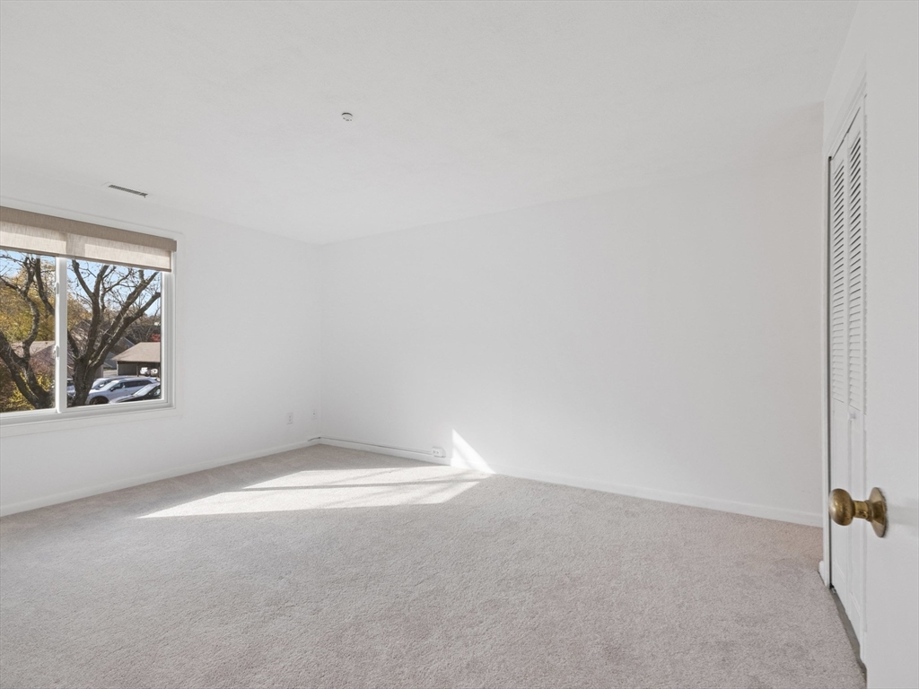 18 Concord Greene, Unit 6 Concord, MA 01742 - Photo 16 of 31 a view of an empty room