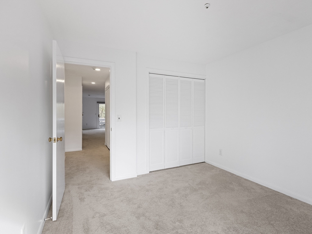 18 Concord Greene, Unit 6 Concord, MA 01742 - Photo 17 of 31 a view of an empty room