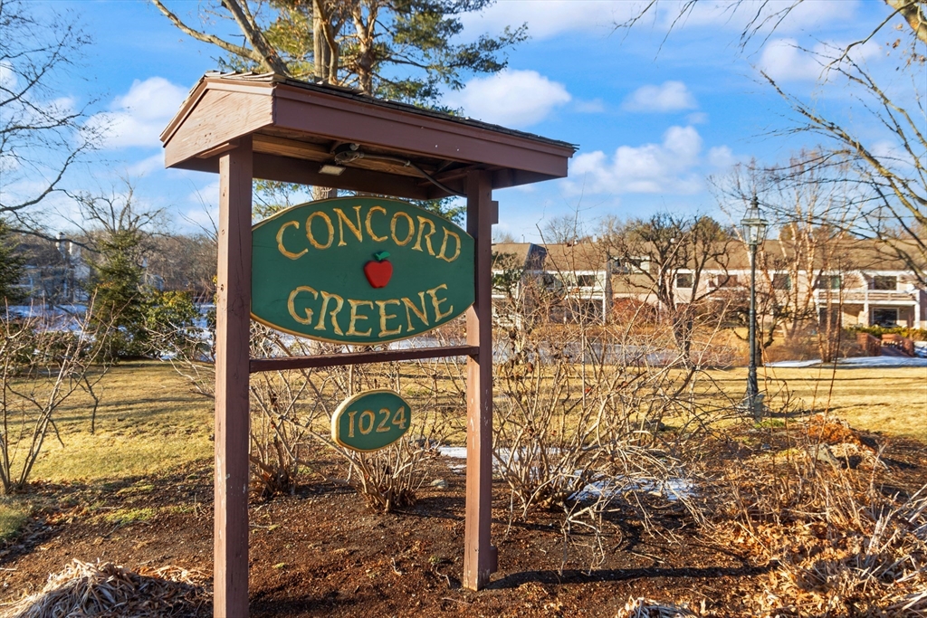 18 Concord Greene, Unit 6 Concord, MA 01742 - Photo 2 of 31 a sign broad on the side of the road