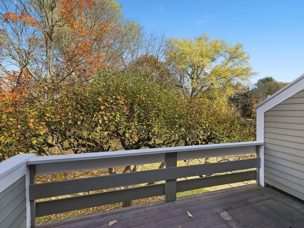 18 Concord Greene, Unit 6 Concord, MA 01742 - Photo 26 of 31 a view of a bench in a forest