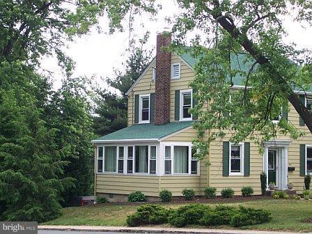 501 South Hammonds Ferry Road Linthicum Heights, MD 21090 - Photo 2 of 30 front view of a house with a yard
