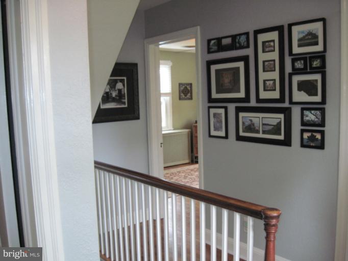 501 South Hammonds Ferry Road Linthicum Heights, MD 21090 - Photo 19 of 30 a view of a hallway and a workspace