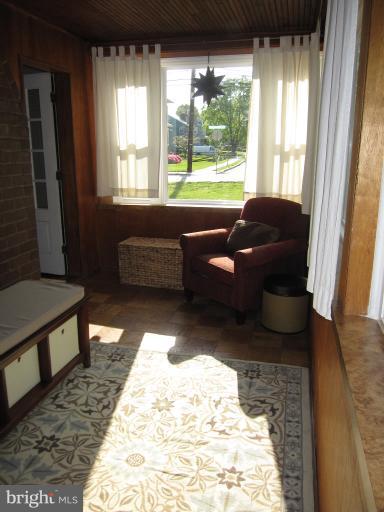 501 South Hammonds Ferry Road Linthicum Heights, MD 21090 - Photo 27 of 30 a living room with furniture and a window
