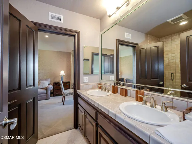 a outdoor living space with patio furniture and a garden