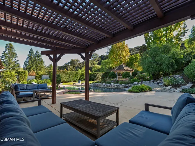 a view of backyard with outdoor space
