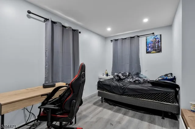 a bedroom with a bed and a closet