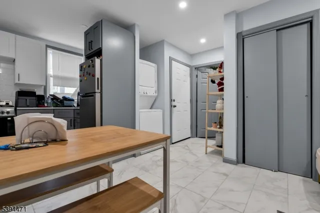 a view of backyard with a garden and deck