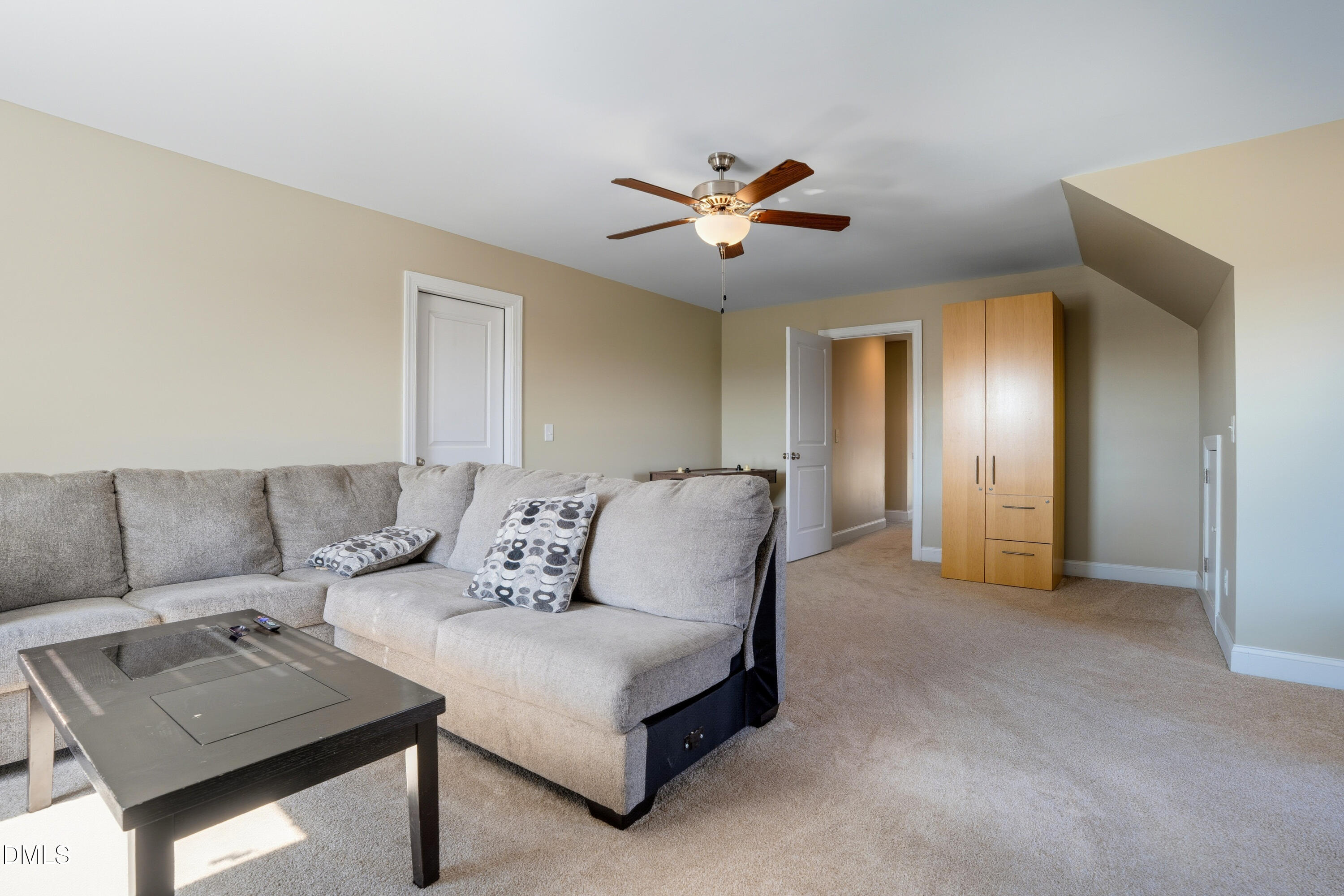 141 Vibernum View Four Oaks, NC 27524 - Photo 13 of 18 a living room with furniture and a ceiling fan