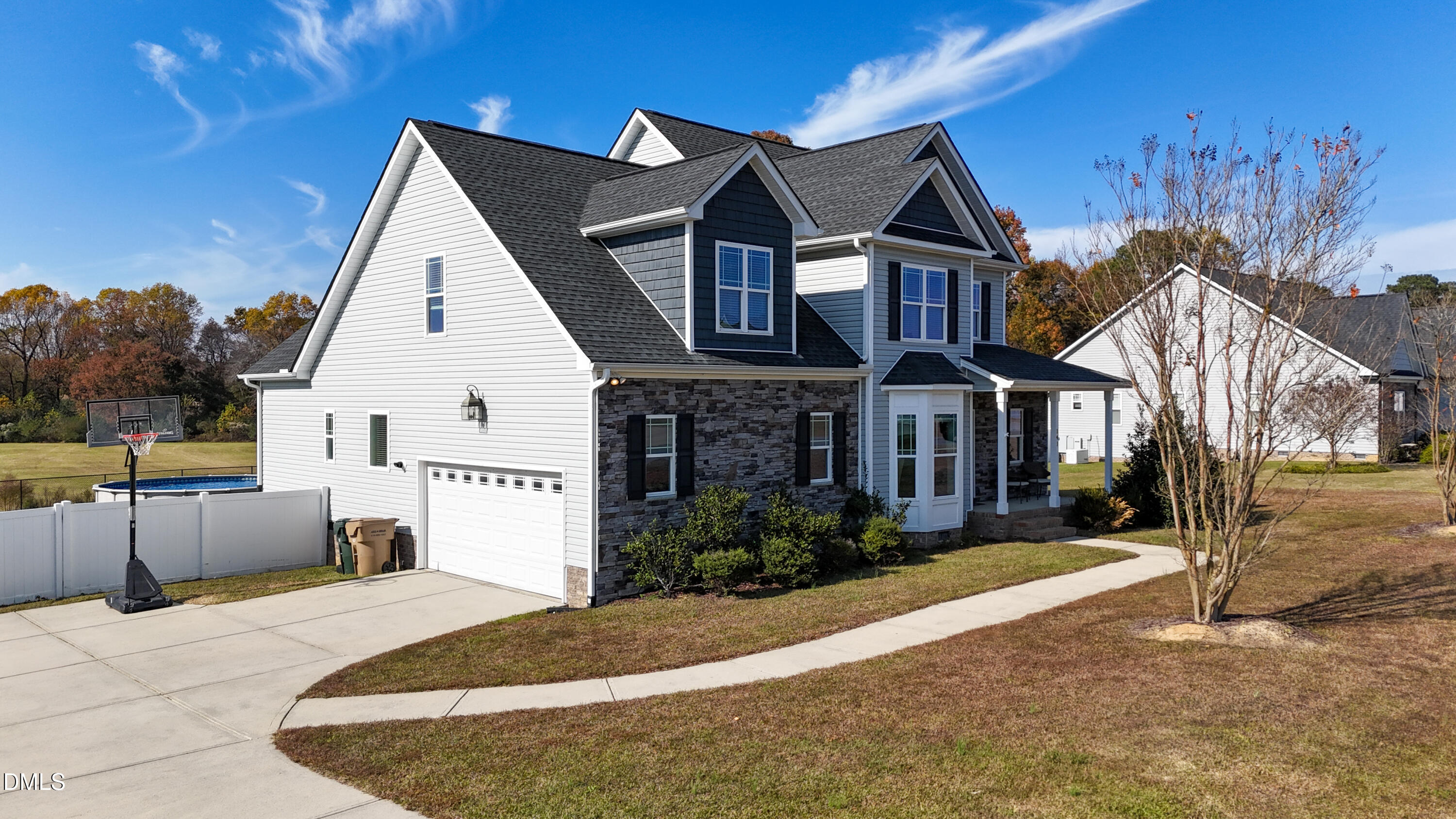 141 Vibernum View Four Oaks, NC 27524 - Photo 15 of 18 a front view of a house with a yard