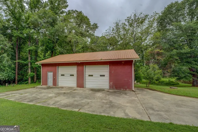 a backyard of a house with lots of green space