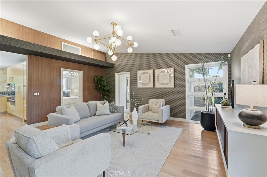 1205 Bryant Road Long Beach, CA 90815 - Photo 13 of 69 a living room with furniture potted plant and a large window