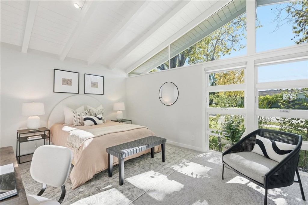1205 Bryant Road Long Beach, CA 90815 - Photo 24 of 69 a bedroom with bed and a large window